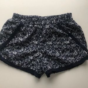 Blue and white patterned fabric shorts
